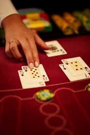 Live Baccarat table with dealer and card layout on taxislot88 login